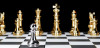 making moves in complex age black and white chess board, gold and silver pieces